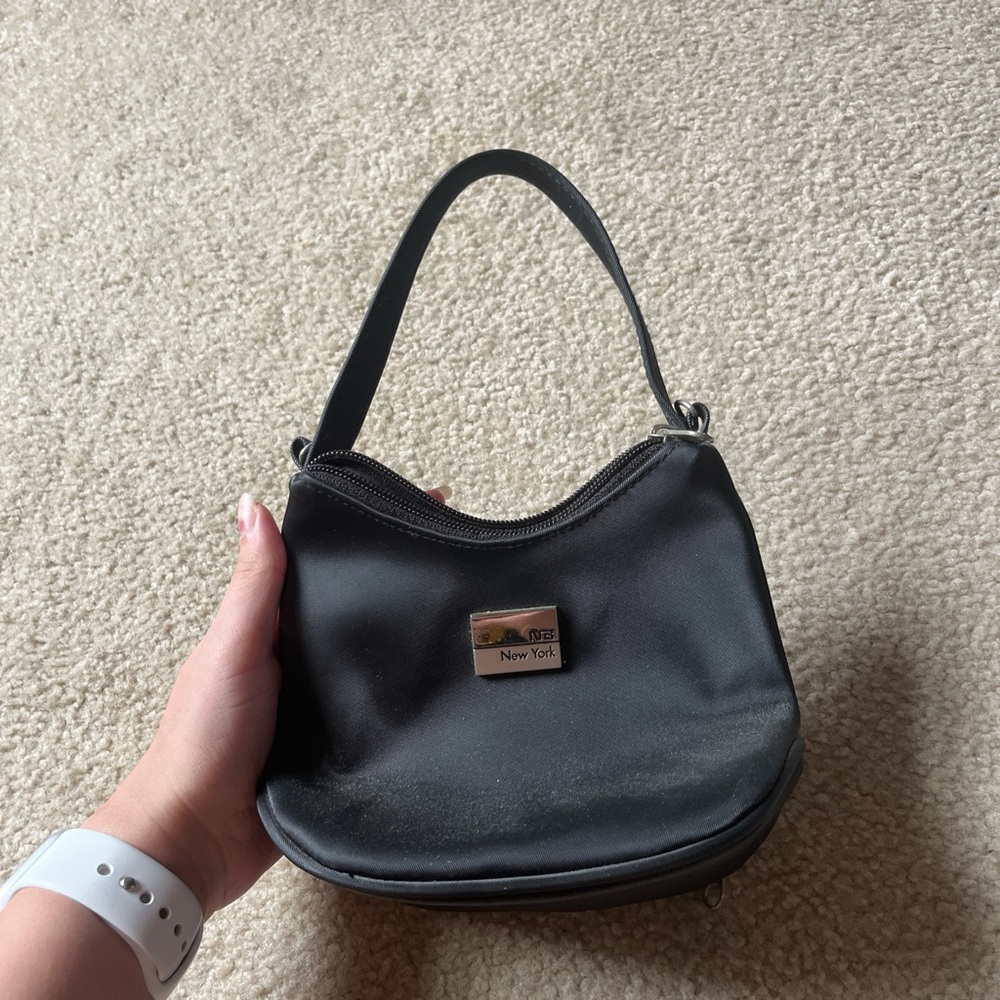 DKNY Black Shoulder Bag with Sleek Crescent Shape